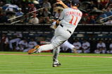 ATLANTA - APRIL 10: Third baseman Ryan Zimmerman #11 of the Washington Nationals fields a short hit and throws to first base for an out against the Atlanta Braves April 10, 2009 at Turner Field in Atlanta, Georgia.  (Photo by Al Messerschmidt/Getty Images)