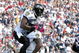 FOXBORO, MA - OCTOBER 4: Willis McGahee #23 of the Baltimore Ravens celebrates with teammate Derrick Mason #85 after McGahee scored a touchdown against the New England Patriots at Gillette Stadium on October 4, 2009 in Foxboro, Massachusetts. (Photo by Jim Rogash/Getty Images)