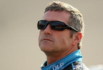 FONTANA, CA - OCTOBER 09:  Bobby Labonte, driver of the #96 DLP Ford, stand on pit road during qualifying for the NASCAR Sprint Cup Series Pepsi 500 at Auto Club Speedway on October 9, 2009 in Fontana, California.  (Photo by Stephen Dunn/Getty Images)
