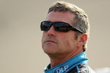 FONTANA, CA - OCTOBER 09:  Bobby Labonte, driver of the #96 DLP Ford, stand on pit road during qualifying for the NASCAR Sprint Cup Series Pepsi 500 at Auto Club Speedway on October 9, 2009 in Fontana, California.  (Photo by Stephen Dunn/Getty Images)