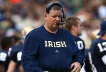 SOUTH BEND, IN - OCTOBER 03: Head coach Charlie Weis of the Notre Dame Fighting Irish watches as his team takes on the Washington Huskies on October 3, 2009 at Notre Dame Stadium in South Bend, Indiana.  Notre Dame defeated Washington 37-30 in overtime.  (Photo by Jonathan Daniel/Getty Images)