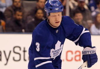 TORONTO, ON - DECEMBER 29:  Wade Belak #3 of the Toronto Maple Leafs skates with the puck against the New York Rangers during the game at the Air Canada Centre on December 29, 2007 in Toronto, Canada.  (Photo by Harry How/Getty Images)