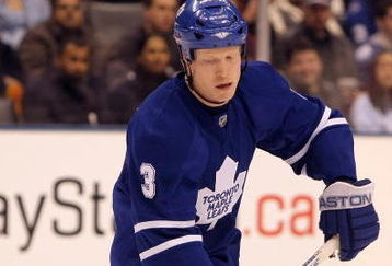 TORONTO, ON - DECEMBER 29:  Wade Belak #3 of the Toronto Maple Leafs skates with the puck against the New York Rangers during the game at the Air Canada Centre on December 29, 2007 in Toronto, Canada.  (Photo by Harry How/Getty Images)