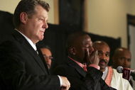 LAS VEGAS - NOVEMBER 04:  Promoter Dan Goosen (L) and Leonard Ellerbe (R) look on as Floyd Mayweather Jr. cries during a post-fight news conference after defeating Carlos Baldomir of Argentina to claim the WBC welterweight championship at the Mandalay Bay Events Center November 4, 2006 in Las Vegas, Nevada. Mayweather announced that he will retire after his next fight.  (Photo by Ethan Miller/Getty Images)