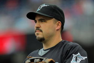 WASHINGTON - AUGUST 06:  First baseman Nick Johnson #20 of the Florida Marlins prepares to take the field against the Washington Nationals at Nationals Park on August 6, 2009 in Washington, DC. The Nationals defeated the Marlins 12-8.  (Photo by Doug Pensinger/Getty Images)