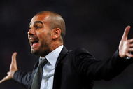 BARCELONA, SPAIN - OCTOBER 03: Coach Josep Guardiola of Barcelona shouts to his players during the La Liga match between Barcelona and Almeria at the Camp Nou Stadium on October 3, 2009 in Barcelona, Spain. Barcelona won the match 1-0. (Photo by Jasper Juinen/Getty Images)