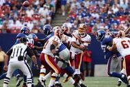 EAST RUTHERFORD, NJ - SEPTEMBER 13:  Jason Campbell #17 of the Washington Redskins throws a pass against the New York Giants on September 13, 2009 at Giants Stadium in East Rutherford, New Jersey.  (Photo by Jim McIsaac/Getty Images)