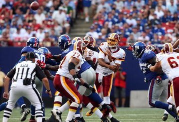 EAST RUTHERFORD, NJ - SEPTEMBER 13:  Jason Campbell #17 of the Washington Redskins throws a pass against the New York Giants on September 13, 2009 at Giants Stadium in East Rutherford, New Jersey.  (Photo by Jim McIsaac/Getty Images)