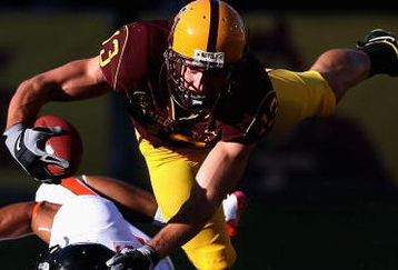 TEMPE, AZ - OCTOBER 03:  Wide receiver Chris McGaha #13 of the Arizona State Sun Devils is brought down by Cameron Collins #5 of the Oregon State Beavers after a 8 yard reception during the college football game at Sun Devil Stadium on October 3, 2009 in Tempe, Arizona.  (Photo by Christian Petersen/Getty Images)