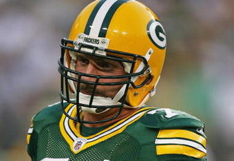 GREEN BAY, WI - SEPTEMBER 13: Aaron Kampman #74 of the Green Bay Packers participates in warm-ups before a game against the Chicago Bears on September 13, 2009 at Lambeau Field in Green Bay, Wisconsin. The Packers defeated the Bears 21-15.  (Photo by Jonathan Daniel/Getty Images)