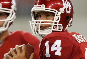 ARLINGTON, TX - SEPTEMBER 05:  Quarterback Sam Bradford #14 of the Oklahoma Sooners warms up before a game against the Brigham Young Cougars at Cowboys Stadium on September 5, 2009 in Arlington, Texas.  (Photo by Ronald Martinez/Getty Images)