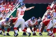 KANSAS CITY, MO - OCTOBER 04:  Quarterback Eli Manning #10 of the New York Giants in action during the game against the Kansas City Chiefs on October 4, 2009 at Arrowhead Stadium in Kansas City, Missouri.  (Photo by Jamie Squire/Getty Images)