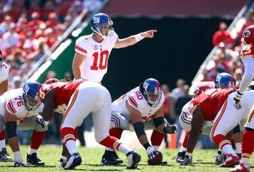 KANSAS CITY, MO - OCTOBER 04:  Quarterback Eli Manning #10 of the New York Giants in action during the game against the Kansas City Chiefs on October 4, 2009 at Arrowhead Stadium in Kansas City, Missouri.  (Photo by Jamie Squire/Getty Images)