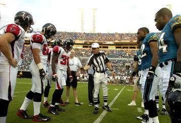 JACKSONVILLE, FL - AUGUST 9: Referee Walt Coleman tosses the coin as the Jacksonville Jaguars host the Atlanta Falcons at Jacksonville Municipal Stadium on August 9, 2008 in Jacksonville, Florida.   (Photo by Al Messerschmidt/Getty Images) 