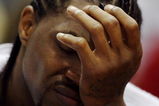 ATLANTA - APRIL 29:  Udonis Haslem #40 of the Miami Heat reacts while sitting on the bench late in the game against the Atlanta Hawks during Game Five of the Eastern Conference Quarterfinals at Philips Arena on April 29, 2009 in Atlanta, Georgia. The Hawks defeated the Heat 106-91. NOTE TO USER: User expressly acknowledges and agrees that, by downloading and/or using this Photograph, user is consenting to the terms and conditions of the Getty Images License Agreement.  (Photo by Doug Benc/Getty Images)