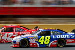 CONCORD, NC - MAY 25:  Juan Pablo Montoya, driver of the #42 Target Chevrolet, races Jimmie Johnson, driver of the #48 Lowe's Chevrolet, during the NASCAR Sprint Cup Series Coca-Cola 600 on May 25, 2009 at Lowe's Motor Speedway in Concord, North Carolina.  (Photo by Jason Smith/Getty Images)