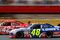 CONCORD, NC - MAY 25:  Juan Pablo Montoya, driver of the #42 Target Chevrolet, races Jimmie Johnson, driver of the #48 Lowe's Chevrolet, during the NASCAR Sprint Cup Series Coca-Cola 600 on May 25, 2009 at Lowe's Motor Speedway in Concord, North Carolina.  (Photo by Jason Smith/Getty Images)