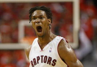 TORONTO,ON - APRIL 24:  Chris Bosh #4 of the Toronto Raptors shows his excitement against the Orlando Magic in Game 3 of the Eastern Conference Quarterfinals on April 24, 2008 at the Air Canada Centre in Toronto, Ontario. The Raptors defeated the Magic 108-94. (Photo by Claus Andersen/Getty Images)