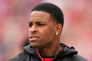 SAN FRANCISCO - OCTOBER 11:  Michael Crabtree, the San Francisco 49ers first round draft pick, watches the 49ers game against the Atlanta Falcons on the sidelines at Candlestick Park on October 11, 2009 in San Francisco, California.  (Photo by Ezra Shaw/Getty Images)