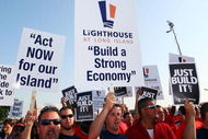 UNIONDALE, NY - AUGUST 04:  Fans rally for support at the Nassau Coliseum prior to marching to the Lighthouse project public hearing at the Adams Playhouse on the campus of Hofstra University on August 4, 2009  in Uniondale, New York.  (Photo by Mike Stobe/Getty Images)