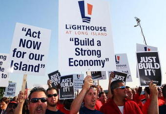 UNIONDALE, NY - AUGUST 04:  Fans rally for support at the Nassau Coliseum prior to marching to the Lighthouse project public hearing at the Adams Playhouse on the campus of Hofstra University on August 4, 2009  in Uniondale, New York.  (Photo by Mike Stobe/Getty Images)