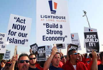 UNIONDALE, NY - AUGUST 04:  Fans rally for support at the Nassau Coliseum prior to marching to the Lighthouse project public hearing at the Adams Playhouse on the campus of Hofstra University on August 4, 2009  in Uniondale, New York.  (Photo by Mike Stobe/Getty Images)