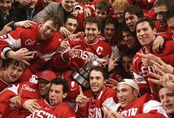 BOSTON - FEBRUARY 12:  The Boston University Terriers pose with the Beanpot trophy after their overtime win over the Boston College Eagles after the Beanpot Tournament Championship Game on February 12, 2007 at TD Banknorth Garden in Boston, Massachusetts. Boston University defeated Boston College 2-1 in overtime. (Photo by Elsa/Getty Images)