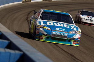 FONTANA, CA - OCTOBER 11:  Jimmie Johnson, driver of the #48 Lowe's Chevrolet, leads Sam Hornish Jr., driver of the #77 Mobil 1 Dodge, during the NASCAR Sprint Cup Series Pepsi 500 at Auto Club Speedway on October 11, 2009 in Fontana, California.  (Photo by Chris Graythen/Getty Images)