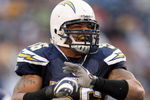 SAN DIEGO - NOVEMBER 25:  Shawne Merriman #56 of the San Diego Chargers reacts to a tackle against the Baltimore Ravens en route to the Chargers's 32-14 win during their NFL Game at Qualcomm Stadium November 25, 2007 in San Diego, California.  (Photo by Donald Miralle/Getty Images)