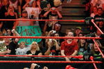 LAS VEGAS - AUGUST 24:  Wrestler Evan Bourne jumps off the ropes at wrestler Chavo Guerrero (C) as wrestler Hornswoggle lies in the foreground during the WWE Monday Night Raw show at the Thomas & Mack Center August 24, 2009 in Las Vegas, Nevada.  (Photo by Ethan Miller/Getty Images)