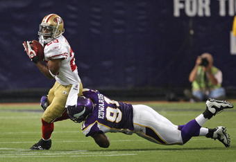 MINNEAPOLIS - SEPTEMBER 27: Marcus Hudson #23 of the San Francisco 49ers is tackled by Ray Edwards #91 of the Minnesota Vikings at the Hubert H. Humphrey Metrodome on September 27, 2009 in Minneapolis, Minnesota. The Vikings defeated the 49ers 27-24. (Photo by Jonathan Daniel/Getty Images) 