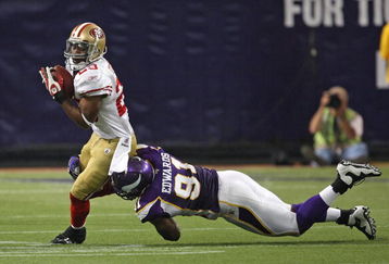 MINNEAPOLIS - SEPTEMBER 27: Marcus Hudson #23 of the San Francisco 49ers is tackled by Ray Edwards #91 of the Minnesota Vikings at the Hubert H. Humphrey Metrodome on September 27, 2009 in Minneapolis, Minnesota. The Vikings defeated the 49ers 27-24. (Photo by Jonathan Daniel/Getty Images) 