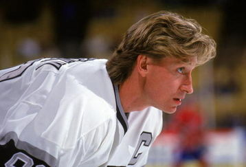 INGLEWOOD, CA - 1989:  Wayne Gretzky #99 of the Los Angeles Kings looks on during a game in 1989 at the Great Western Forum in Inglewood, California.  Wayne Gretzky played for the Kings from 1988 - 1996.  (Photo by Otto Greule Jr/Getty Images)




