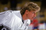 INGLEWOOD, CA - 1989:  Wayne Gretzky #99 of the Los Angeles Kings looks on during a game in 1989 at the Great Western Forum in Inglewood, California.  Wayne Gretzky played for the Kings from 1988 - 1996.  (Photo by Otto Greule Jr/Getty Images)




