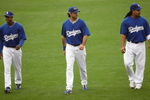 LOS ANGELES - OCTOBER 14:  (L-R) Juan Pierre #9, Andre Ethier #16, and Manny Ramirez #99 of the Los Angeles Dodgers walk in the outfield as they work out for the NLCS against the Philadelphia Phillies on October 14, 2009 at Dodger Stadium in Los Angeles, California.  (Photo by Stephen Dunn/Getty Images)