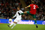 LONDON, ENGLAND - OCTOBER 14: David Beckham of England crosses the ball during the FIFA 2010 World Cup Qualifying Group 6 match between England and Belarus at Wembley Stadium on October 14, 2009 in London, England. (Photo by Phil Cole/Getty Images)