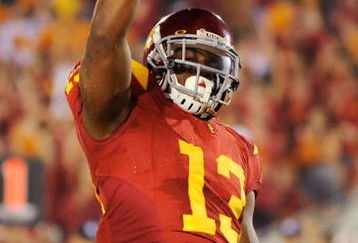 LOS ANGELES, CA - SEPTEMBER 26:  Stafon Johnson#13 of the USC Trojans celebrates his touchdown against the Washington State Cougars during the fourth quarter of the college football game at the Los Angeles Memorial Coliseum on September 26, 2009 in Los Angeles, California.  (Photo by Kevork Djansezian/Getty Images)