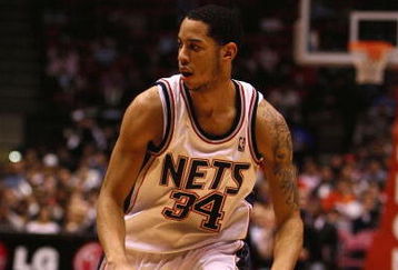 EAST RUTHERFORD, NJ - FEBRUARY 10:  Devin Harris #34 of the New Jersey Nets drives to the basket against the San Antonio Spurs during their game on February 10, 2009 at The Izod Center in East Rutherford, New Jersey.  NOTE TO USER: User expressly acknowledges and agrees that, by downloading and/or using this Photograph, user is consenting to the terms and conditions of the Getty Images License Agreement.  (Photo by Al Bello/Getty Images)