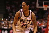 EAST RUTHERFORD, NJ - FEBRUARY 10:  Devin Harris #34 of the New Jersey Nets drives to the basket against the San Antonio Spurs during their game on February 10, 2009 at The Izod Center in East Rutherford, New Jersey.  NOTE TO USER: User expressly acknowledges and agrees that, by downloading and/or using this Photograph, user is consenting to the terms and conditions of the Getty Images License Agreement.  (Photo by Al Bello/Getty Images)