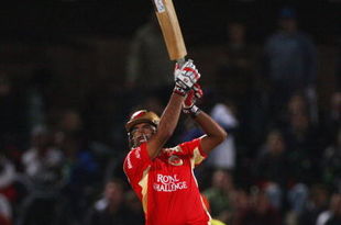 PORT ELIZABETH, SOUTH AFRICA - APRIL 20:  Robin Uthappa of Bangalore hits out during IPL T20 match between Chennai Super Kings and Royal Challengers Bangalore at St Georges Cricket Ground on April 20, 2009 in Port Elizabeth, South Africa.  (Photo by Tom Shaw/Getty Images)