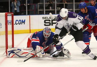 NEW YORK - OCTOBER 14: Wayne Simmonds #17 of the Los Angeles Kings is stopped by Henrik Lundqvist #30 of the New York Rangers at Madison Square Garden on October 14, 2009 in New York, New York.  The Rangers defeated the Kings 5-4. (Photo by Bruce Bennett/Getty Images)