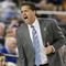 GLENDALE, AZ - MARCH 26:  Head Coach John Calipari of the Memphis Tigers adjusts his team against the Missouri Tigers in the Sweet 16 of the NCAA Division I Men's Basketball Tournament at the University of Phoenix Stadium on March 26, 2009 in Glendale, Arizona.  (Photo by Ronald Martinez/Getty Images)