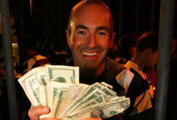 DAVIDSON, NC - OCTOBER 14:  NASCAR driver Marcos Ambrose shows money raised after he was locked up for charity at the NASCAR Second Annual Jail & Bail held at Brickhouse Tavern  October 14, 2009 in Davidson, North Carolina.  Funds raised during the event will go to The NASCAR Foundation and Brienne Davis Scholarship Fund.  (Photo by Jason Smith/Getty Images)