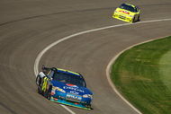 FONTANA, CA - OCTOBER 11:  Jeff Gordon, driver of the #24 Pepsi Chevrolet, leads teammate Mark Martin, driver of the #5 Kellogg's Chevrolet, during the NASCAR Sprint Cup Series Pepsi 500 at Auto Club Speedway on October 11, 2009 in Fontana, California.  (Photo by Chris Graythen/Getty Images)