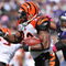 BALTIMORE - OCTOBER 11:  Cedric Benson #32 of the Cincinnati Bengals runs the ball against the Baltimore Ravens at M&T Bank Stadium on October 11, 2009 in Baltimore, Maryland. The Bengals defeated the Ravens 17-14. (Photo by Larry French/Getty Images)