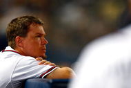 ATLANTA - JUNE 25:  Chipper Jones #10 of the Atlanta Braves looks on in the ninth inning against the New York Yankees at Turner Field on June 25, 2009 in Atlanta, Georgia.  (Photo by Kevin C. Cox/Getty Images)