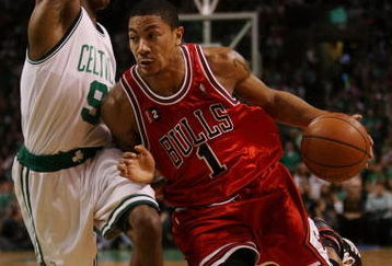 BOSTON - MAY 02:  Derrick Rose #1 of the Chicago Bulls drives to the net as Rajon Rondo #9 of the Boston Celtics defends in Game Seven of the Eastern Conference Quarterfinals during the 2009 NBA Playoffs at TD Banknorth Garden on May 2, 2009 in Boston, Massachusetts. The Celtics defeated the Bulls 109-99. NOTE TO USER: User expressly acknowledges and agrees that, by downloading and or using this photograph, User is consenting to the terms and conditions of the Getty Images License Agreement.  (Photo by Elsa/Getty Images)
