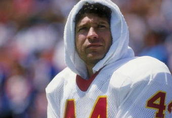 29 Oct 1989: Running back John Riggins of the Washington Redskins looks on during a game against the Los Angeles Raiders at the Los Angeles Coliseum in Los Angeles, California. The Raiders defeated the Redskins 37-24.