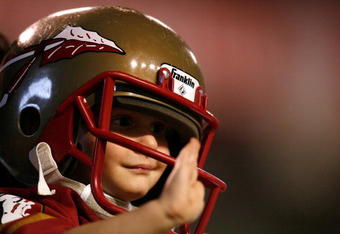 RALEIGH, NC - OCTOBER 16:  A young Florida State Seminoles' fan cheers against the North Carolina State Wolfpack during the game at Carter-Finley Stadium on September 16, 2008 in Raleigh, North Carolina.  (Photo by Kevin C. Cox/Getty Images)