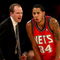 LOS ANGELES, CA - NOVEMBER 25:  Head coach Lawrence Frank and Devin Harris #34 of the New Jersey Nets confer during the game with the Los Angeles Lakers on November 25, 2008 at Staples Center in Los Angeles, California. The Lakers won 120-93.   NOTE TO USER: User expressly acknowledges and agrees that, by downloading and/or using this Photograph, user is consenting to the terms and conditions of the Getty Images License Agreement.  (Photo by Stephen Dunn/Getty Images)